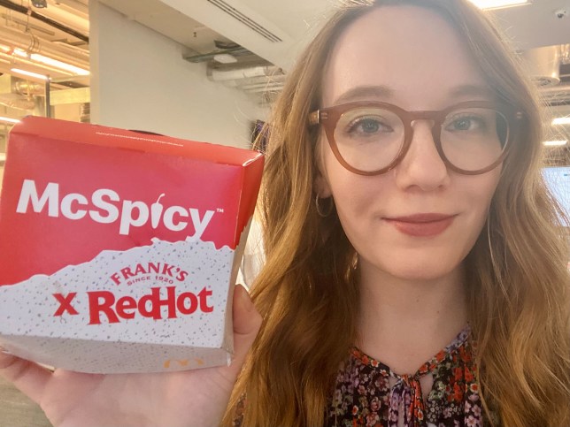 Courtney holding the McSpicy box