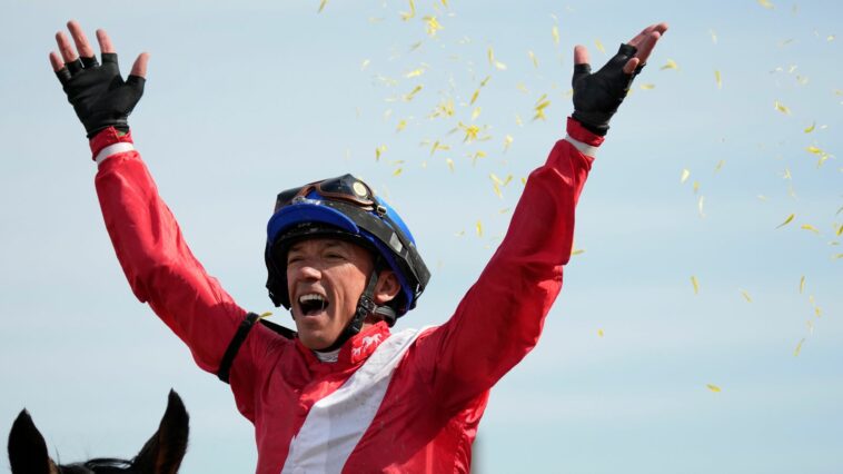 Frankie Dettori celebrates atop Inspiral after winning the Breeders' Cup Filly and Mare Turf