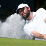 FILE - Scottie Scheffler hits out of the sand on the second green during the final round of The Players Championship golf tournament Sunday, March 17, 2024, in Ponte Vedra Beach, Fla. (AP Photo/Marta Lavandier, File)