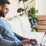 man using a laptop to shop online