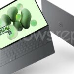 dell laptops floating back to back and opened showing slimness, green wallpaper screen with balloons, there's a copilot key on the bottom keyboard row