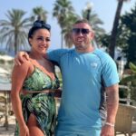 HUSBAND AND WIFE REBECCA PHILLIPS, 29, AND JOHN PHILLIPS, 40 on holiday