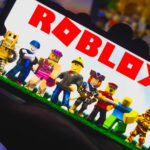 Roblox shares drop more than 20% as company cuts annual bookings forecast on muted player spending