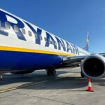 Passengers boarding on a Ryanair plane at Stansted London International Airport