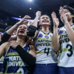 Bella Belen and the NU Lady Bulldogs  after winning the UAAP Season 86 women's volleyball championship with a sweep of UST Tigresse