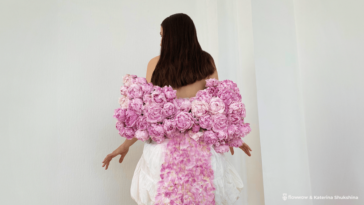 The designer models her crop top made of real peonies.