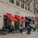 People walking past Gail's cafe in Bloomsbury, Central London, UK.