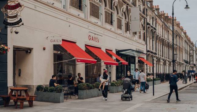 People walking past Gail's cafe in Bloomsbury, Central London, UK.