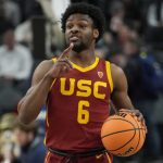 Southern California's Bronny James (6) brings the ball up the court during the first half of an NCAA college basketball game against Washington in the first round of the Pac-12 tournament Wednesday, March 13, 2024, in Las Vegas. It’s unclear where the son of NBA great LeBron James might land in this month’s NBA draft.