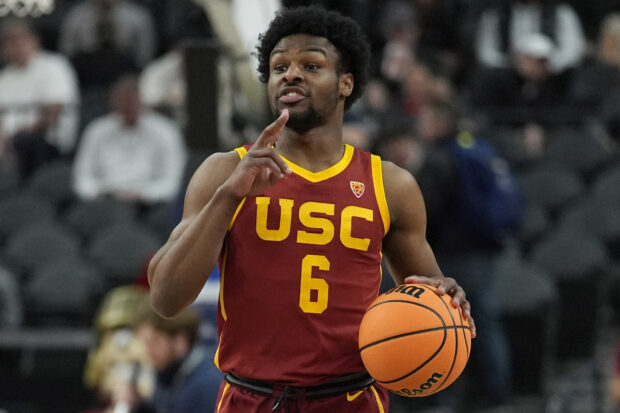 Southern California's Bronny James (6) brings the ball up the court during the first half of an NCAA college basketball game against Washington in the first round of the Pac-12 tournament Wednesday, March 13, 2024, in Las Vegas. It’s unclear where the son of NBA great LeBron James might land in this month’s NBA draft.