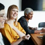 Entrepreneur with coworker in office meeting