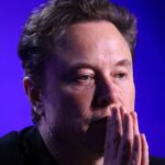 Elon Musk threatens to ban Apple devices from his companies over OpenAI partnership