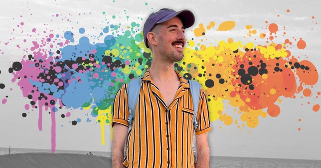 Chris Weir with a baseball cap and rucksack, with the Pride colours behind him