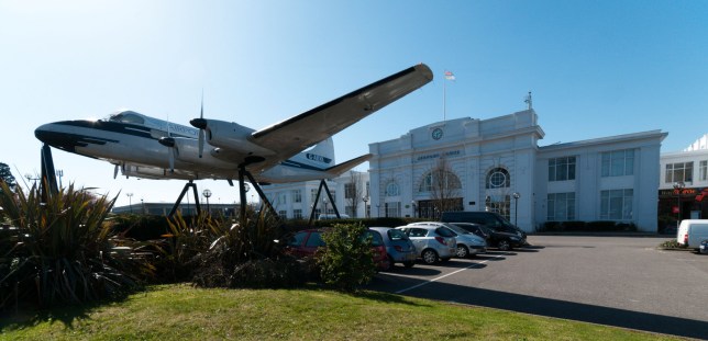 CN0911 An aircraft spanning the entrance to Airport House, the original terminal building for the old Croydon Airport.