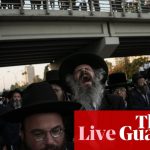 Israel-Gaza war live: ultra-Orthodox Jews block major highway in protest against Israel’s new military service ruling