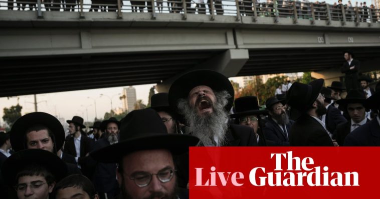 Israel-Gaza war live: ultra-Orthodox Jews block major highway in protest against Israel’s new military service ruling