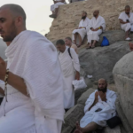 Muslim pilgrims pray on Mount Arafat in hajj climax