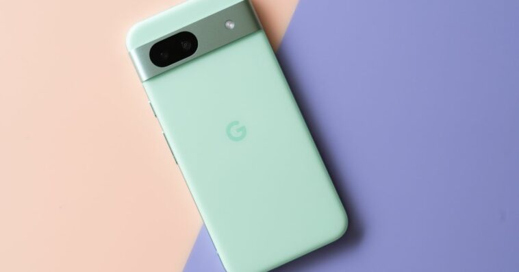 Google Pixel 8A in aloe green showing back panel.