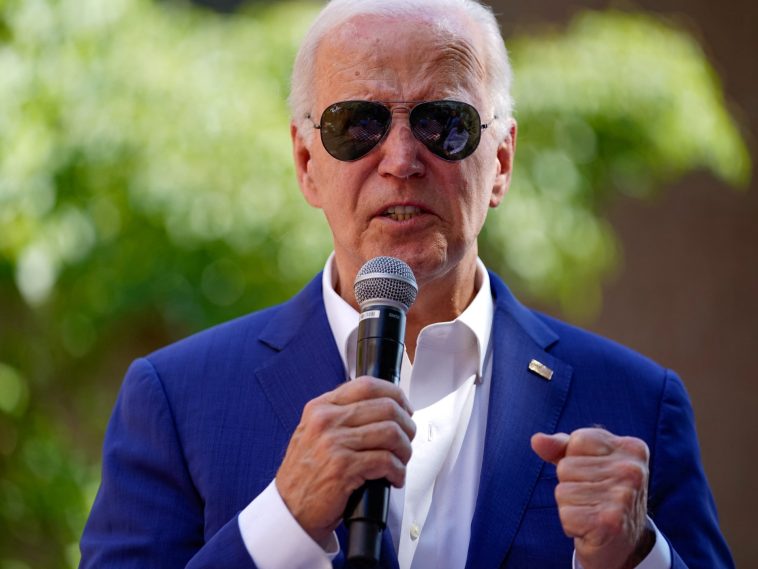 Biden tells Democrats he’s ‘committed’ to re-election bid, beating Trump