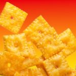 Cheez-Its on a colourful orange background