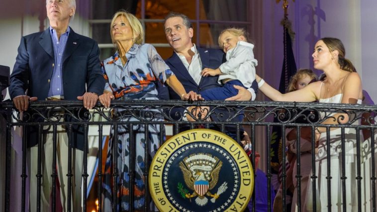 WASHINGTON, DC - JULY 04: (L-R) U.S. President Joe Biden, first lady Jill Biden, Hunter Biden holding Beau Biden and Naomi Biden watch fireworks on the South Lawn of the White House on July 04, 2023 in Washington, DC. The Bidens hosted a Fourth of July BBQ and concert with military families and other guests on the South Lawn of the White House. (Photo by Tasos Katopodis/Getty Images)