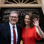 Prime Minister Keir Starmer and wife Victoria gesture to waiting media outside the door of 10 Downing Street, London, UK on 4th July 2024