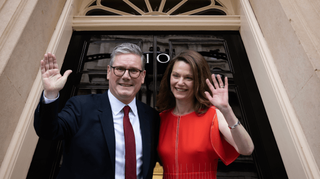 Prime Minister Keir Starmer and wife Victoria gesture to waiting media outside the door of 10 Downing Street, London, UK on 4th July 2024