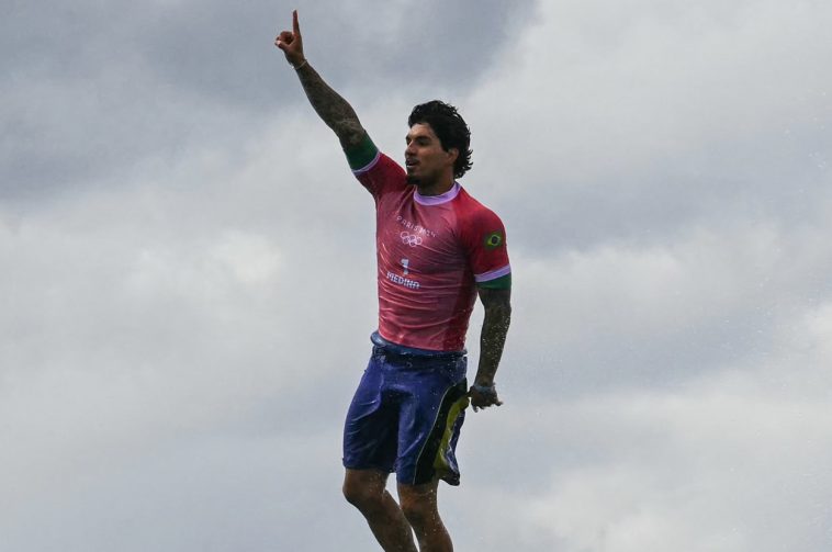 People Are Saying This Surfing Picture Is The Coolest Photo From The Paris Olympics So Far