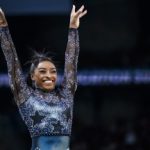 PARIS, FRANCE - JULY 28: Simone Biles from Team United States reacts after her exercise on the balance beam during day two of the Olympic Games Paris 2024 at the Bercy Arena on July 28, 2024 in Paris, France. (Photo by Tom Weller/VOIGT/GettyImages)