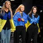 Ksenia Schnaider, Elena Reva and Nadya Dzyak walk the runway with Ukrainian flags at the Ukrainian Fashion Week presents: Ksneniaschnaider, Elenareva, Nadya Dzyak show during London Fashion Week in September 2023