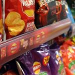 Walkers crisp packets on shop shelves