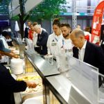 Athletes getting food at the Olympic Village in Paris