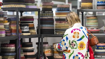 A buyer inspects trimmings at the recent edition of Première Vision fabric fair in Paris.