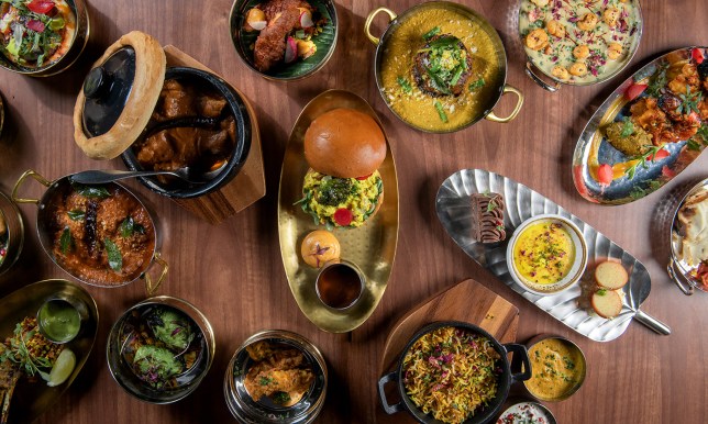 A table of different dishes at Atul Kochhar's Kanishka