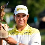 Hideki Matsuyama, of Japan, holds his trophy after winning the St. Jude Championship golf tournament Sunday, Aug. 18, 2024, in Memphis, Tenn. (AP Photo/Mark Humphrey)