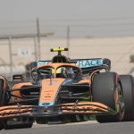 Picture of a Formula 1 car driving on a track.