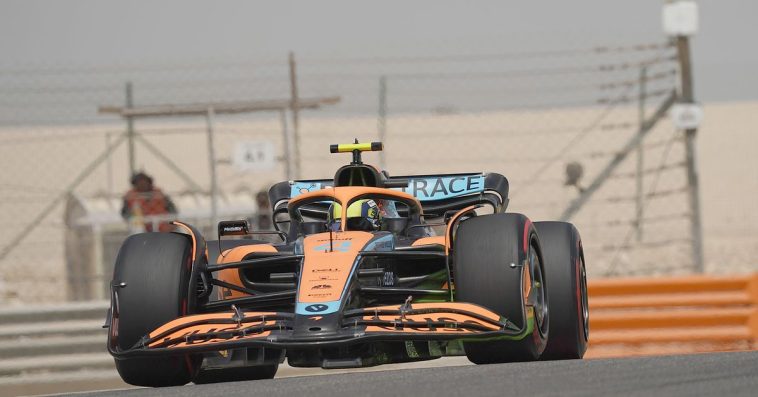 Picture of a Formula 1 car driving on a track.