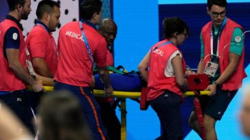 Olympic swimmer collapses after heat race, carried off on stretcher