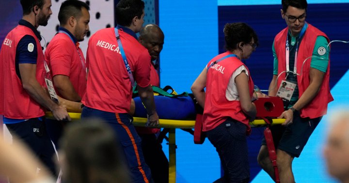 Olympic swimmer collapses after heat race, carried off on stretcher