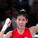 Chinese Taipei's Lin Yu-Ting (left) celebrates following victory against Turkey's Esra Yildiz Kahraman