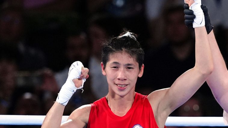 Chinese Taipei's Lin Yu-Ting (left) celebrates following victory against Turkey's Esra Yildiz Kahraman