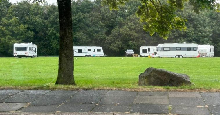 Travellers move to playing fields as group told to leave park just 3 miles away