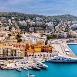 Blue sea and colourful buildings in the cityscape of Lympia Port and Nice, Cote d'Azur, France