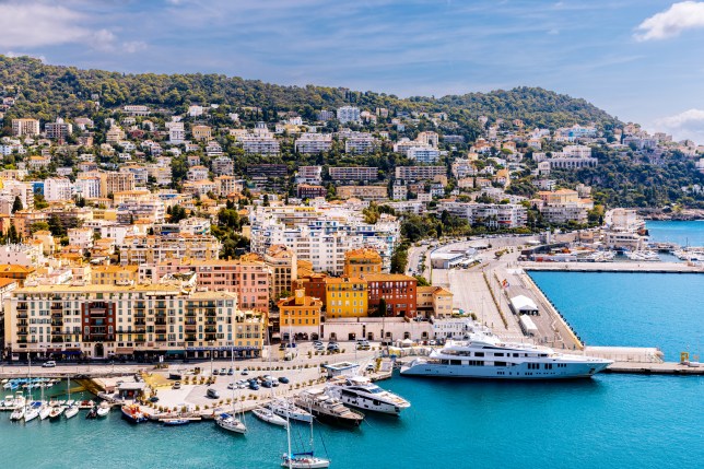 Blue sea and colourful buildings in the cityscape of Lympia Port and Nice, Cote d'Azur, France