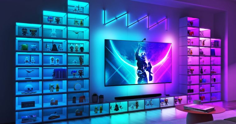 A flat screen TV surrounded by 54 of Nanoleaf’s color-changing Expo Smart Display Cases.