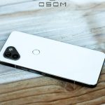 A picture of the OSOM OV1 smartphone laying face down.