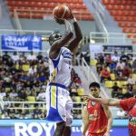 New Magnolia Hotshots import Jabari Bird against Rain or Shine Elastopainters defenders during a PBA Governors' Cup quarterfinals game