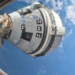 A photo showing the Starliner spacecraft docked at the ISS