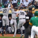 Sep 21, 2024; Oakland, California, USA; New York Yankees designated hitter Giancarlo Stanton (27) is congratulated by right fielder Juan Soto (22) after hitting a three-run home run against the Oakland Athletics in the third inning at the Oakland-Alameda County Coliseum. Mandatory Credit: Cary Edmondson-Imagn Images