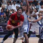 San Miguel Beermen's June Mar Fajardo with a teardrop shot over Converge defenders during the PBA Governors' Cup quarterfinals.